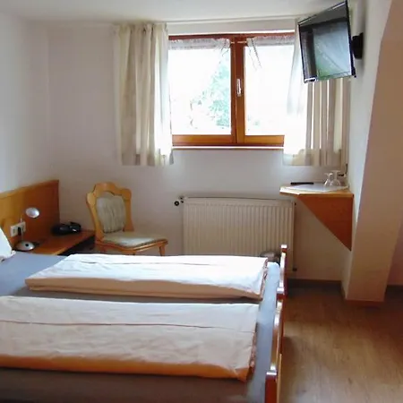 Garni Tanne -